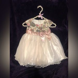 Beautiful pink, green, gold, and cream tulle dress.